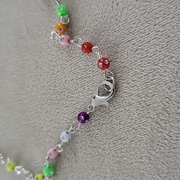 Rosary in a bottle tiny multicolor rosary necklace in a glass bottle - Picture 5 of 6